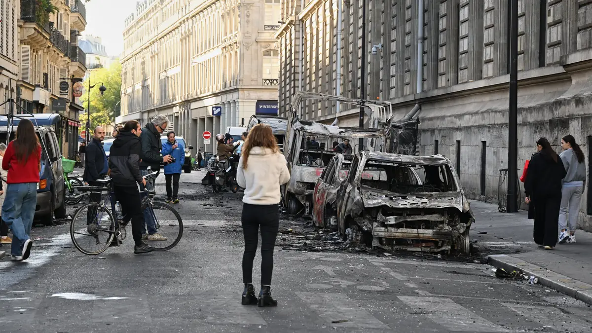 Macron expresses ‘anger’ and ‘shame’ as French protests see at least 2,400 arrests